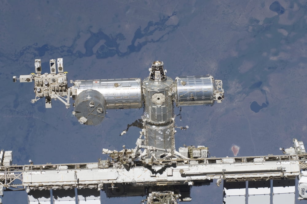 A close-up view of a section of the International Space Station Canvas Art - Stocktrek Images (34 x 23)