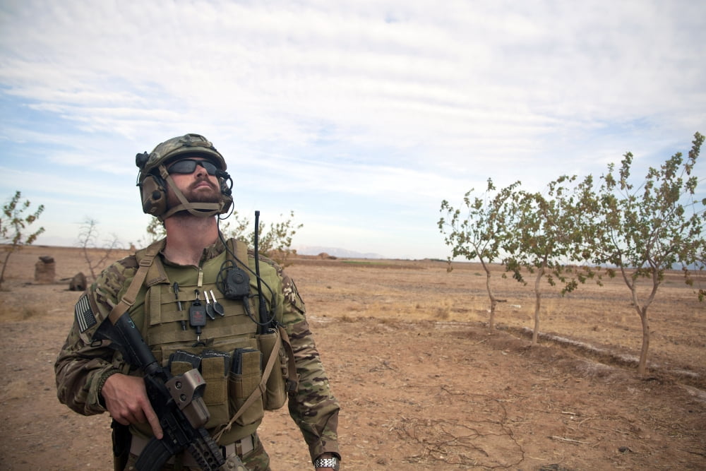 A coalition force member looks for air support in Afghanistan Canvas Art - Stocktrek Images (35 x 23)