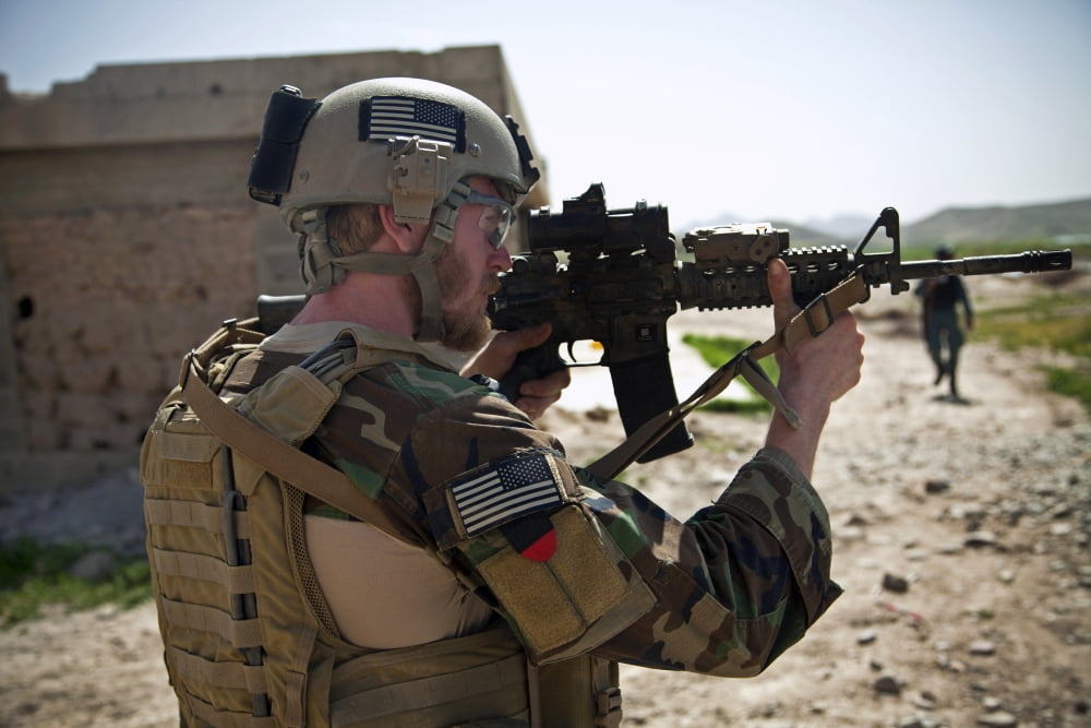 A coalition force member maintains security in Afghanistan Canvas Art - Stocktrek Images (35 x 23)