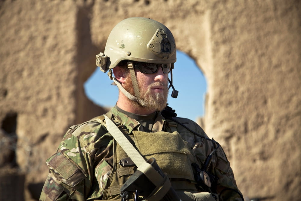 A coalition force member maintains security in an Afghan village Canvas Art - Stocktrek Images (35 x 23)
