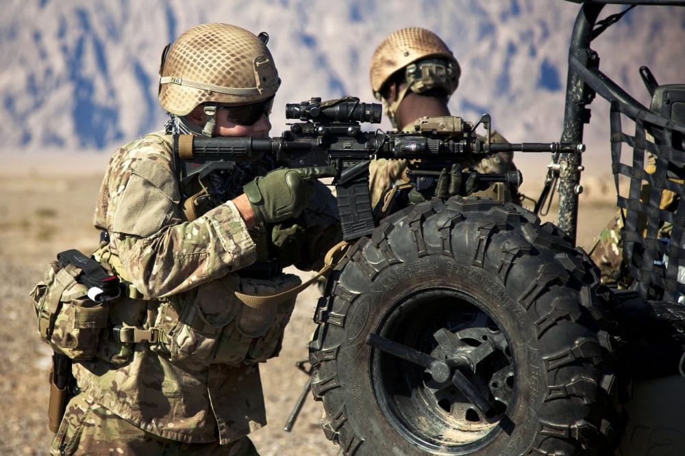A coalition force member maintains security in an Afghan village Canvas Art - Stocktrek Images (35 x 23)