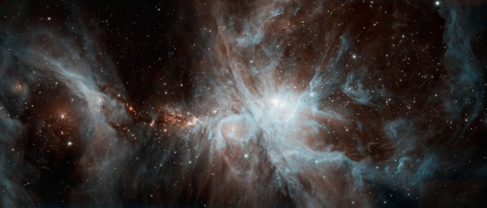 A colony of hot young stars in the Orion Nebula Canvas Art - Stocktrek Images (43 x 18)