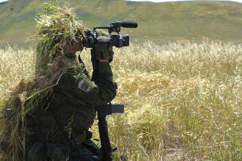 A combat videographer practices evasion techniques Canvas Art - Stocktrek Images (35 x 23)