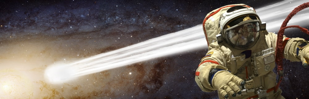 A comet passes by an astronaut in deep space Canvas Art - Marc WardStocktrek Images (25 x 8)