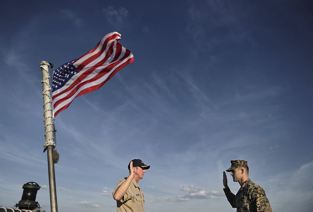 A commander administers the oath of enlistment to a Staff Sergeant Canvas Art - Stocktrek Images (34 x 24)