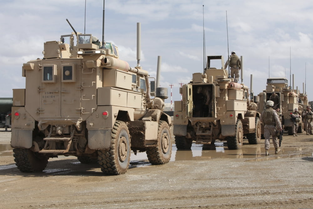 A convoy of MRAP vehicles near Camp Leatherneck Afghanistan Canvas Art - Stocktrek Images (34 x 23)