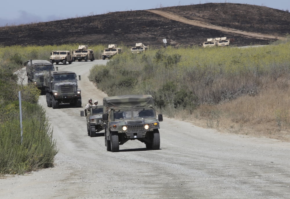 A convoy of military vehicles Canvas Art - Stocktrek Images (34 x 24)