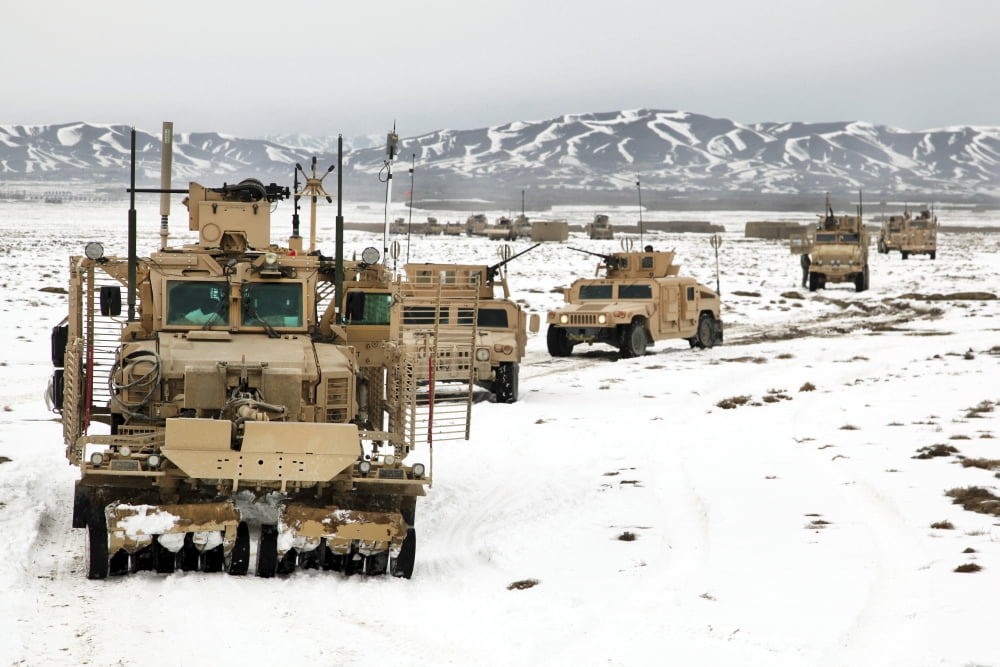 A convoy of vehicles during a route clearing procedure in Afghanistan Canvas Art - Stocktrek Images (34 x 23)
