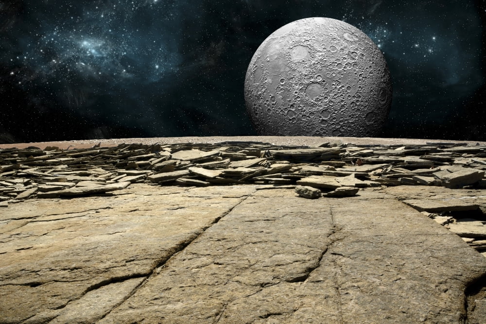 A cratered moon rises over a rocky and barren alien world Canvas Art - Marc WardStocktrek Images (18 x 12)