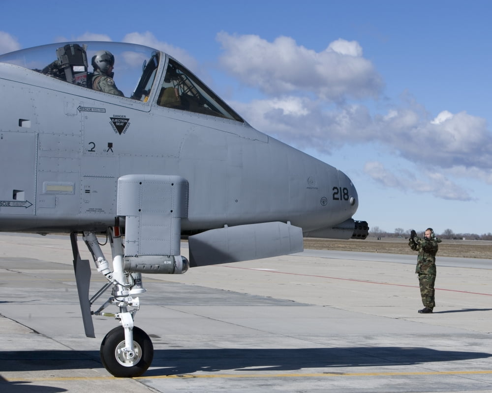 A crew chief marshalls an A-10 Thunderbolt Canvas Art - HIGH-G ProductionsStocktrek Images (31 x 25)