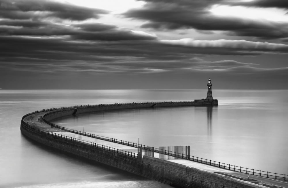 A curving pier with a lighthouse at the endSunderland tyne and wear england Canvas Art - John Short Design Pics (38 x 24)