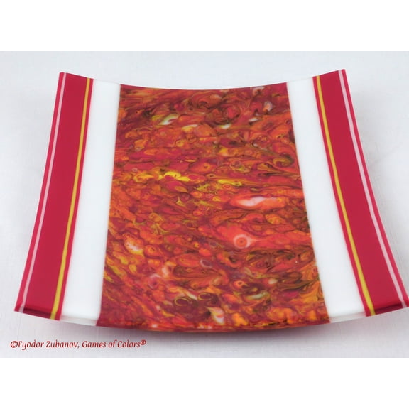 A decorative fused glass plate "Fire taming"