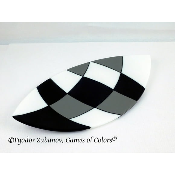 A decorative fused glass plate "Warped checkers"