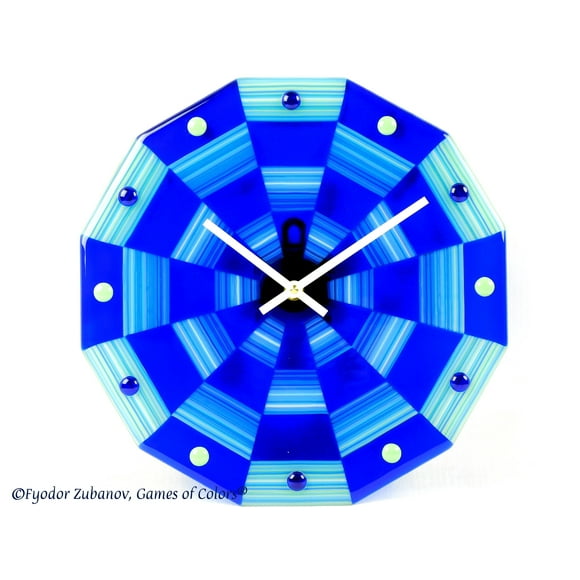 A decorative fused glass wall clock "Blue ribbons"