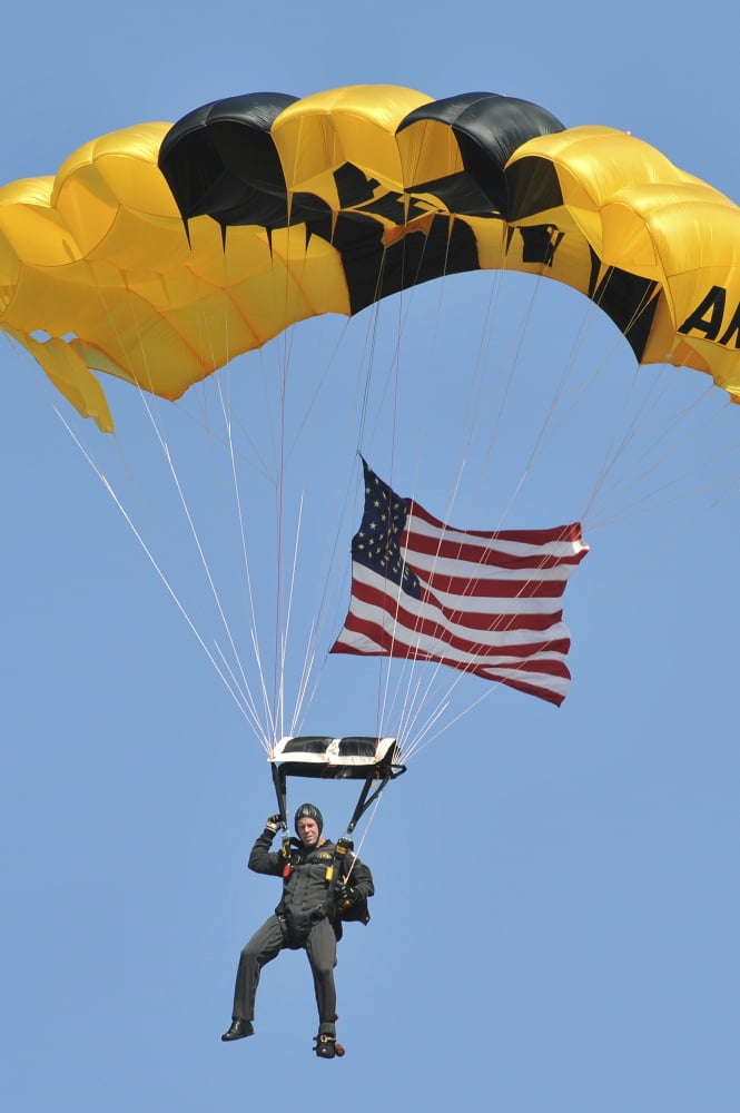 A ember of the Golden Knights Parachute Team descends through the sky Canvas Art - Stocktrek Images (24 x 35)