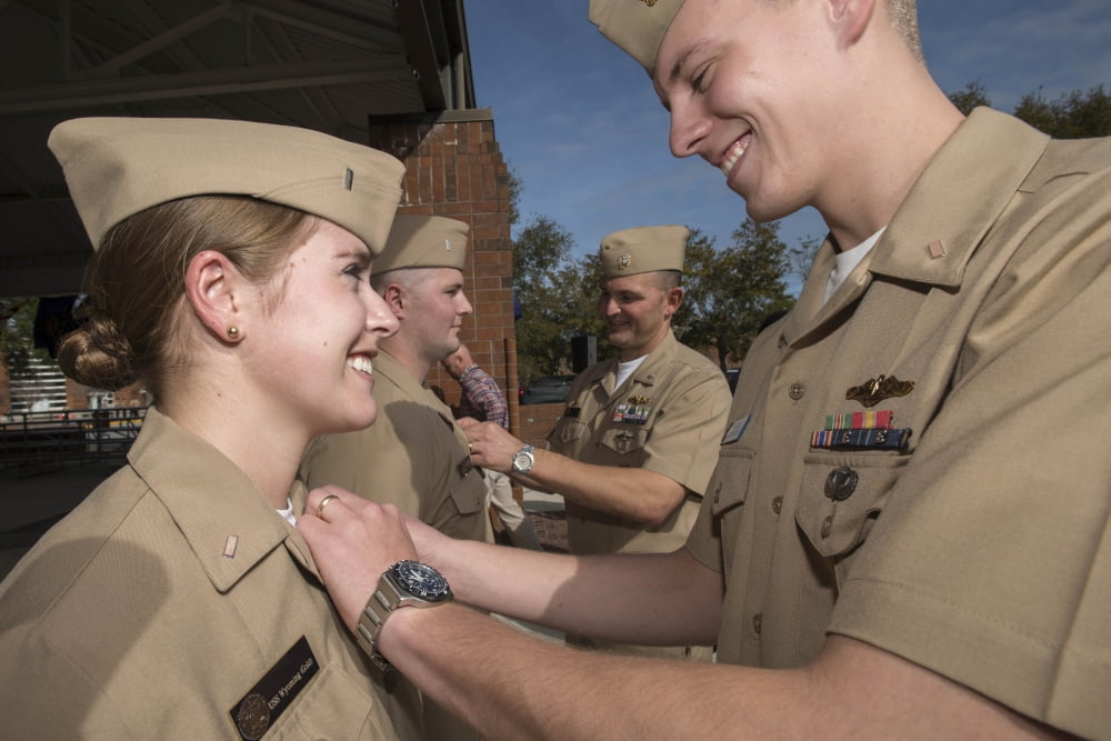 A female officer recieves the submarine officer warfare device Canvas Art - Stocktrek Images (35 x 23)