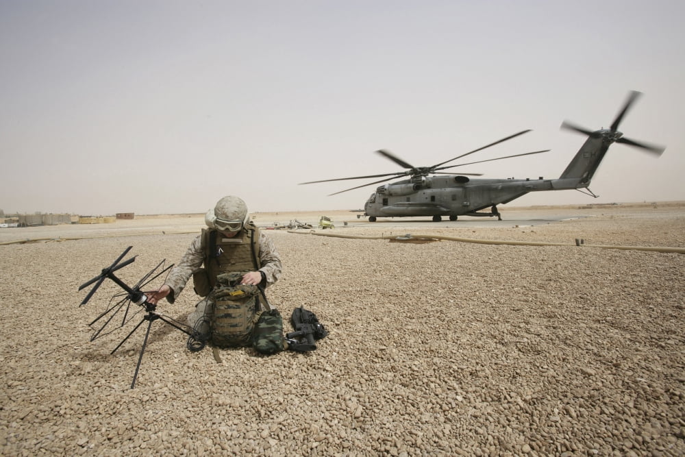 A field radio operator sets up satellite communication Canvas Art - Stocktrek Images (34 x 23)