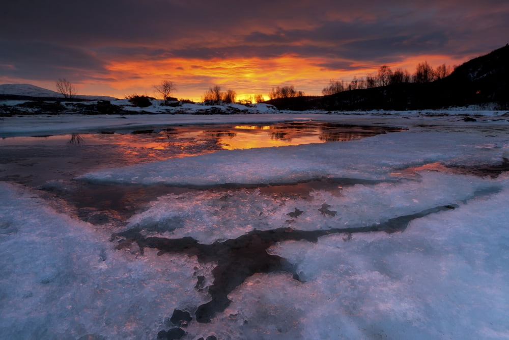 A fiery sunrise over Lavangsfjord Troms Norway Canvas Art - Arild HeitmannStocktrek Images (17 x 12)