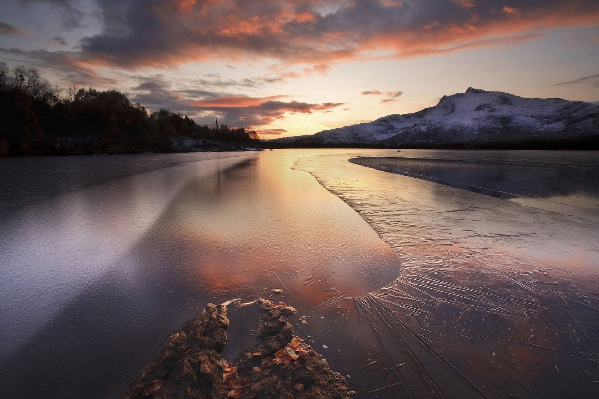 A frozen Straumen Lake on Tjeldoya Island in Nordland County Norway Canvas Art - Arild HeitmannStocktrek Images (35 x 23)