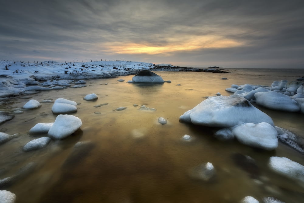 A frozen rusty bay on Andoya Island in Nordland County Norway Canvas Art - Arild HeitmannStocktrek Images (18 x 12)