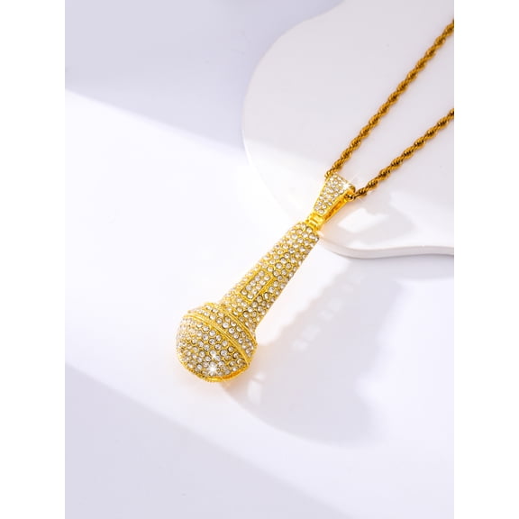 A gold microphone pendant necklace, a 2025 fashion style, is suitable for wearing when going out.