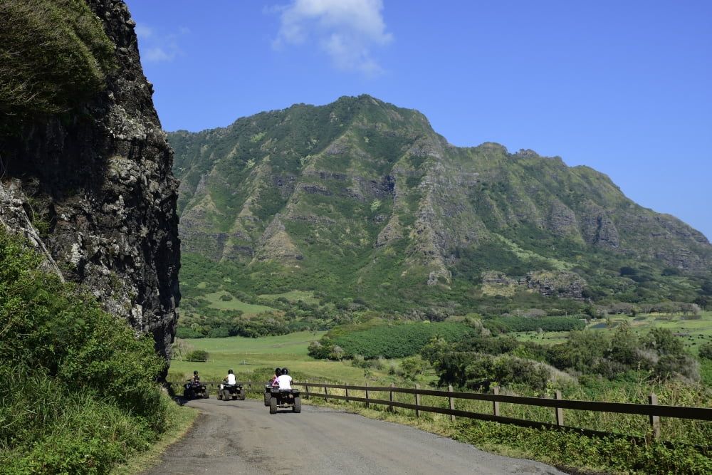 A group of ATV quad riders take to the trail near Koolau Range in Oahu Hawaii Canvas Art - Ryan RossottoStocktrek Images (18 x 12)