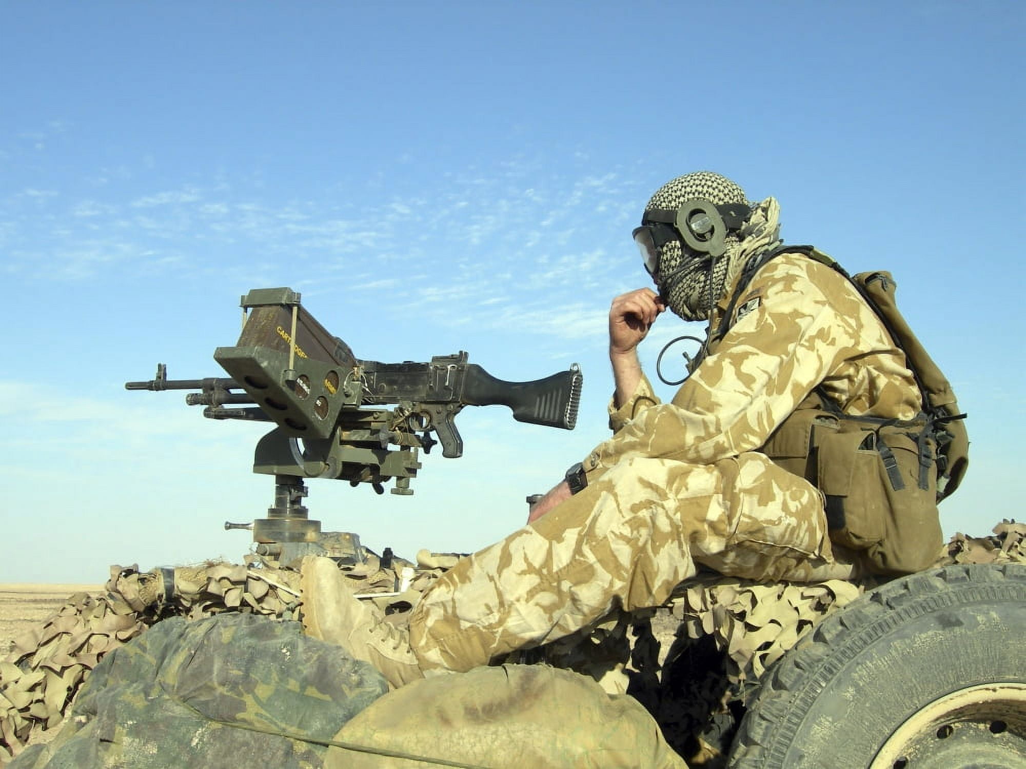 A gunner sits atop a British Army WMIK Land Rover Canvas Art - Andrew ChittockStocktrek Images (33 x 25)