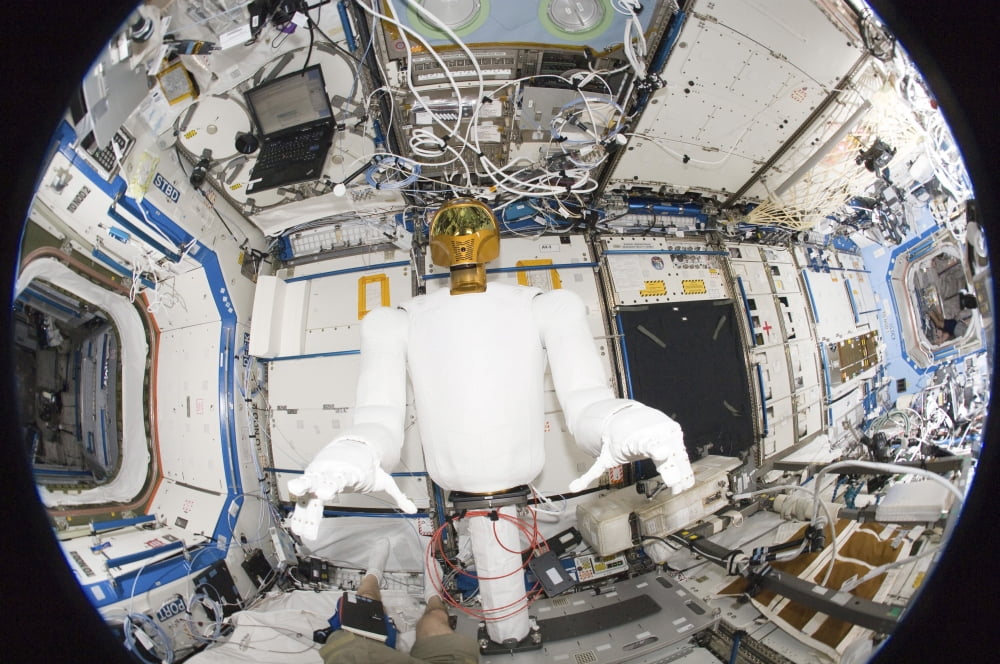 A humanoid robot in the Destiny laboratory of the International Space Station Canvas Art - Stocktrek Images (35 x 23)