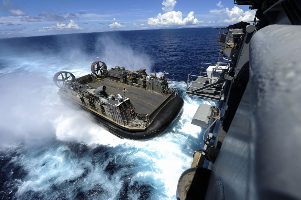 A landing craft air cushion enters the well deck of USS Bonhomme Richard Canvas Art - Stocktrek Images (34 x 23)