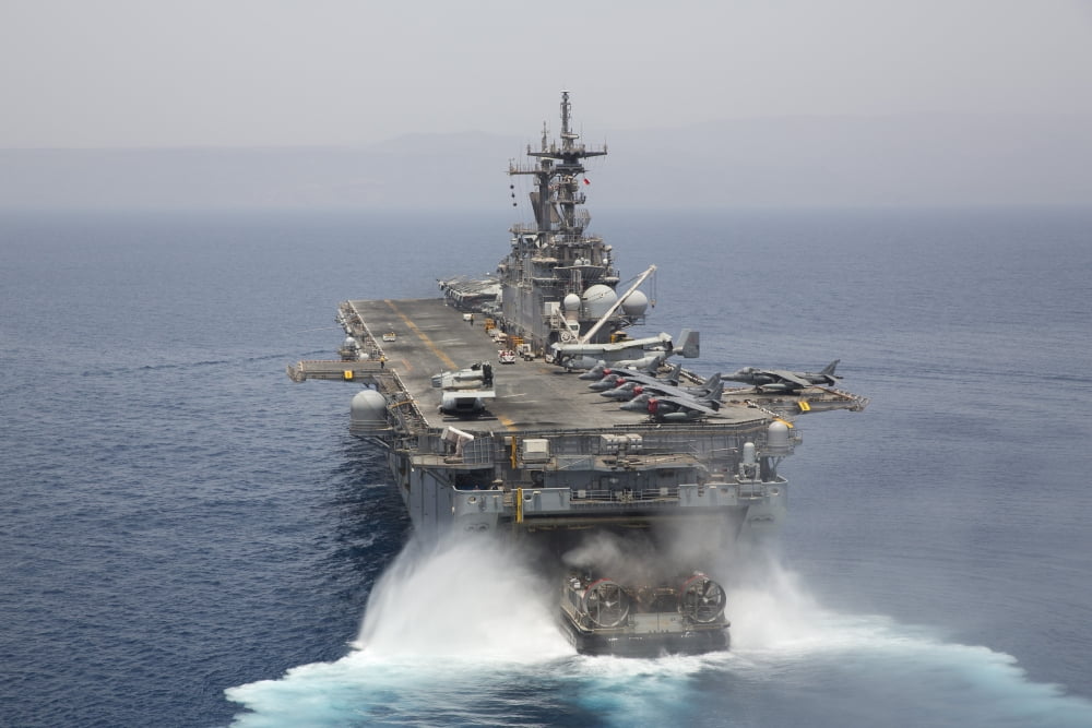 A landing craft air cushion enters the well deck of USS Kearsarge Canvas Art - Stocktrek Images (35 x 23)