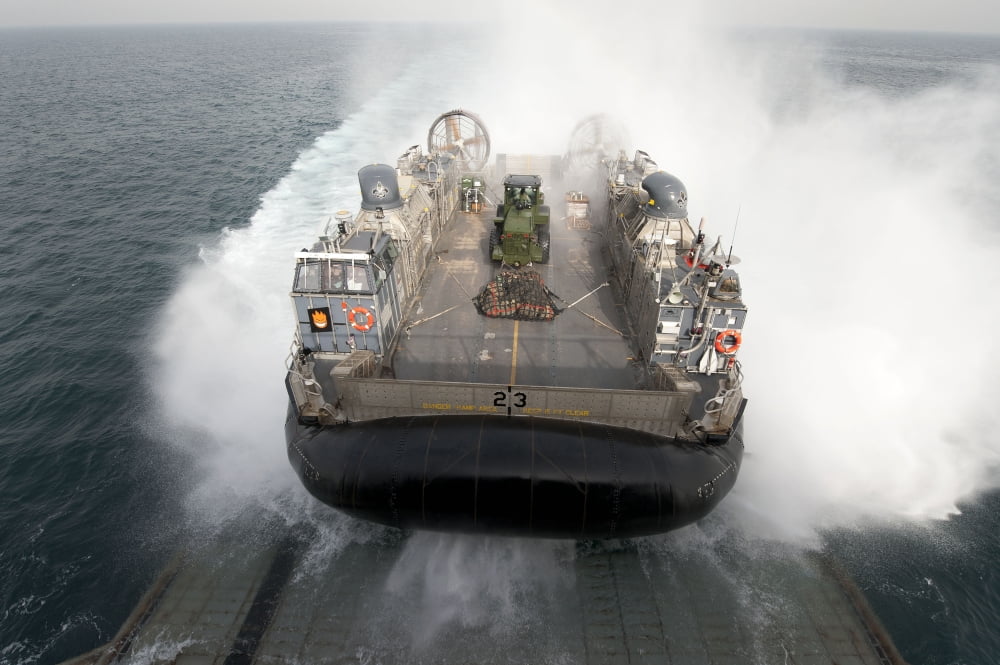 A landing craft air cushion enters the well deck of USS Pearl Harbor Canvas Art - Stocktrek Images (35 x 23)