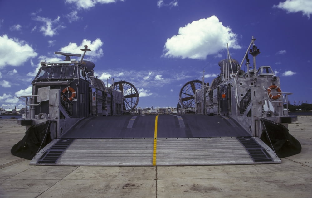 A landing craft air cushion is deflated on a ramp in Pearl Harbor Hawaii Canvas Art - Michael WoodStocktrek Images (18 x 11)