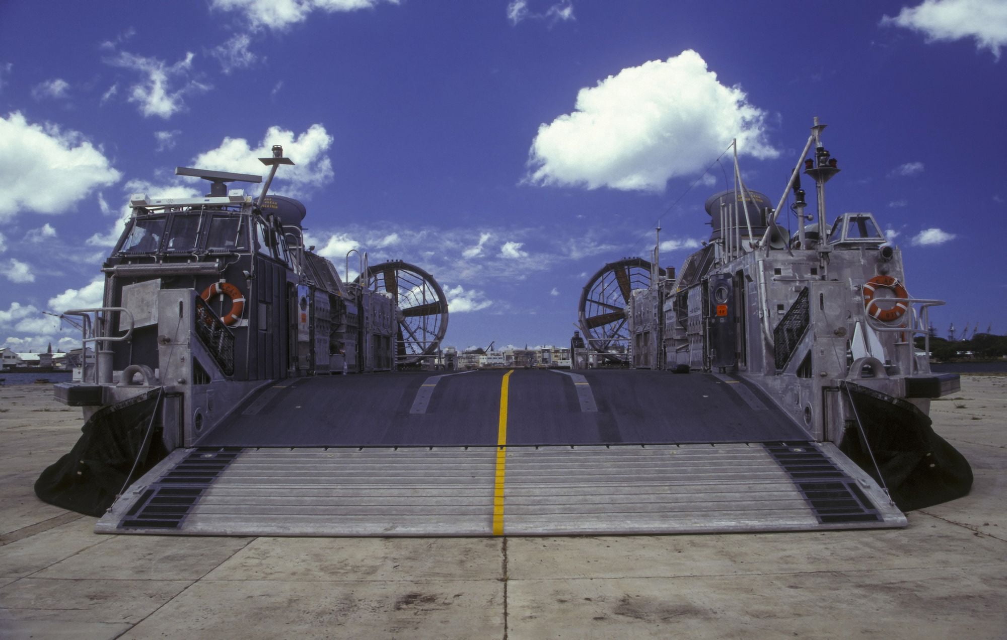 A landing craft air cushion is deflated on a ramp in Pearl Harbor Hawaii Canvas Art - Michael WoodStocktrek Images (35 x 22)