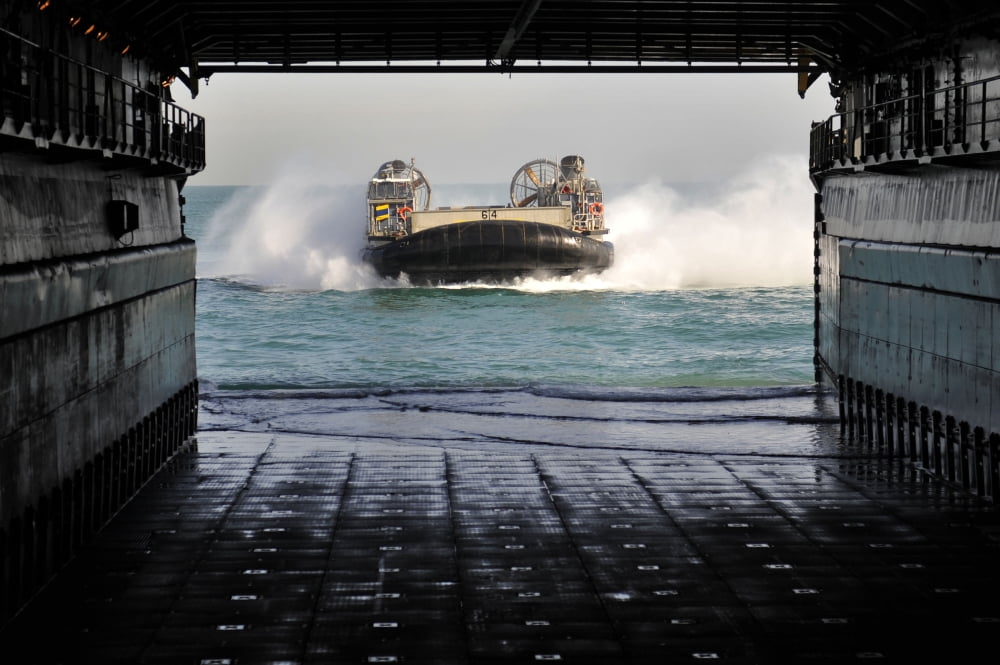 A landing craft air cushion prepares to enter the well deck of USS Pearl Harbor Canvas Art - Stocktrek Images (35 x 23)