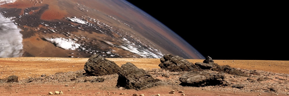 A large planet rises over the airless environment of a rocky alien landscape Canvas Art - Marc WardStocktrek Images (48 x 16)