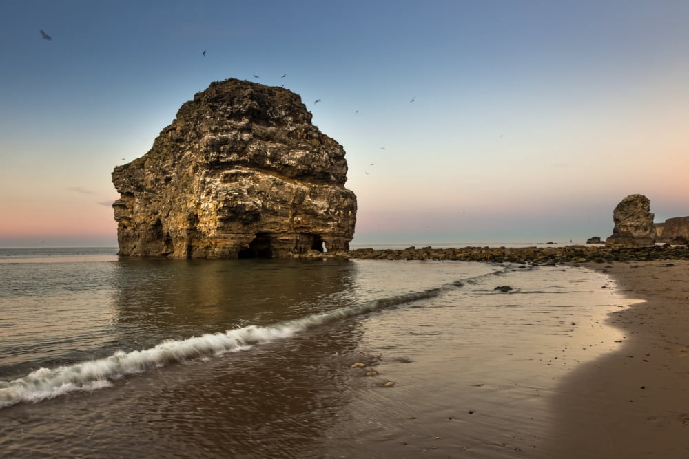 A large rock formation on the coast at sunset South Shields Tyne and Wear England Canvas Art - John Short Design Pics (38 x 24)