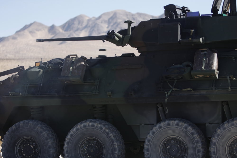 A light armored vehicle fires its 25mm Bushmaster chain gun Canvas Art - Stocktrek Images (34 x 23)