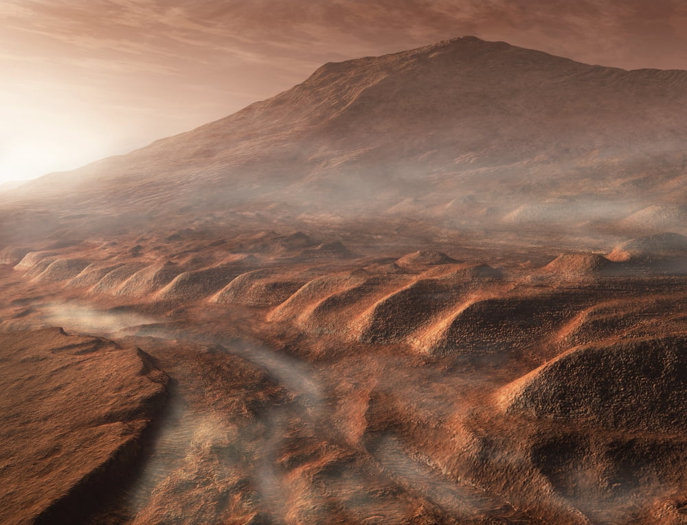 A light fog forms in a desiccated gully in Gale Crater Mars Canvas Art - Steven HobbsStocktrek Images (16 x 13)