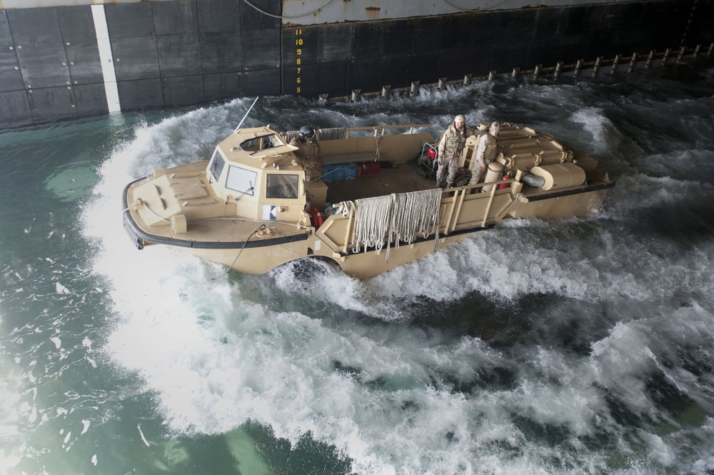 A lighter amphibious re-supply cargo departs the well deck of USS Pearl Harbor Canvas Art - Stocktrek Images (35 x 23)