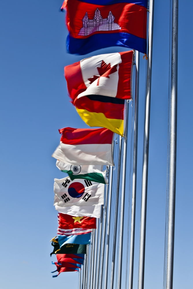A line of flags represent the countries taking part in exercise Khaan Quest 2011 Canvas Art - Stocktrek Images (23 x 35)