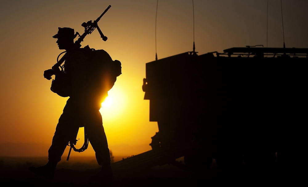 A machine gunner prepares to load an amphibious assault vehicle Canvas Art - Stocktrek Images (36 x 22)