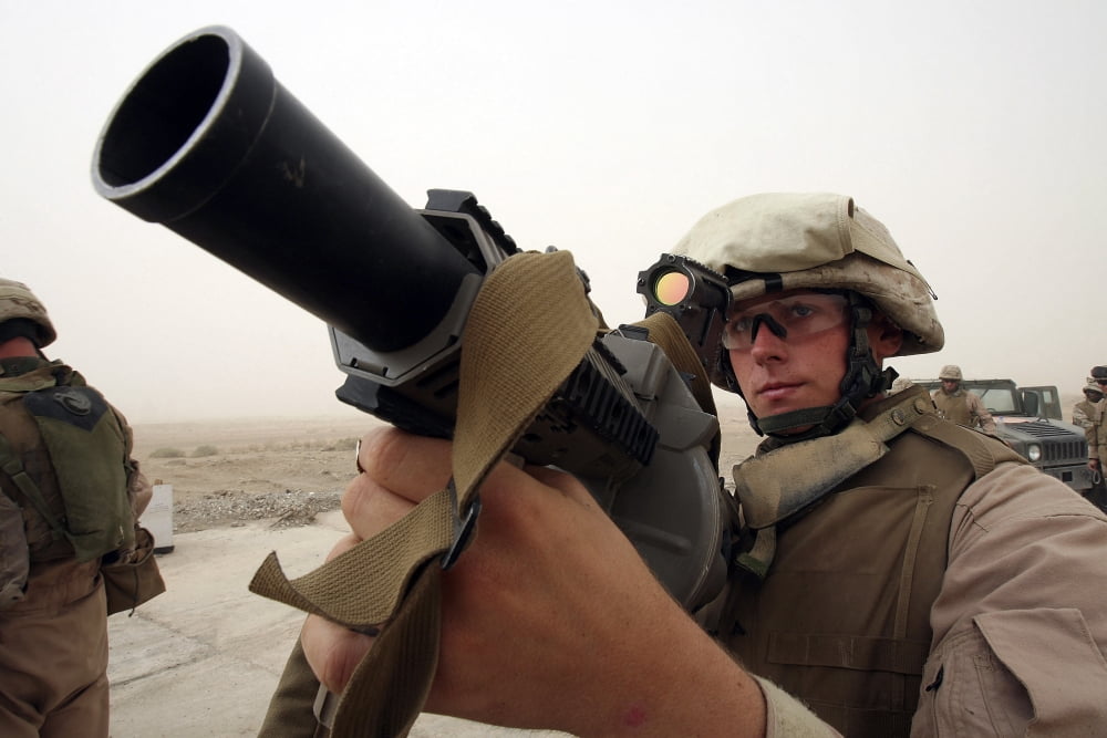 A marine aims in with a M-32 Multiple Grenade Launcher Canvas Art - Stocktrek Images (34 x 23)
