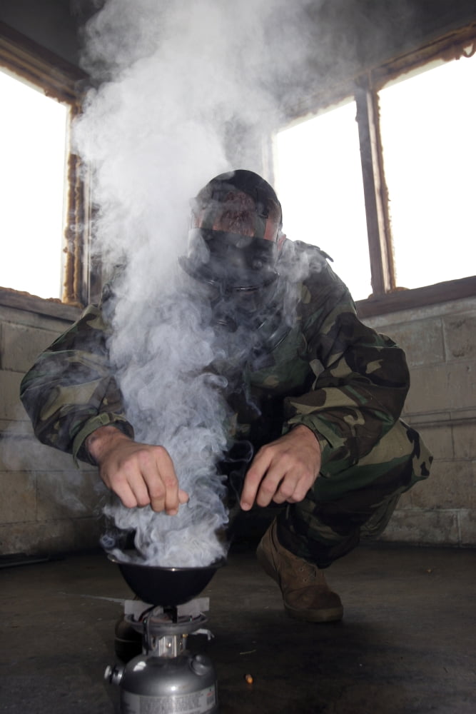 A marine fills the gas chamber with more CS gas Canvas Art - Stocktrek Images (23 x 35)