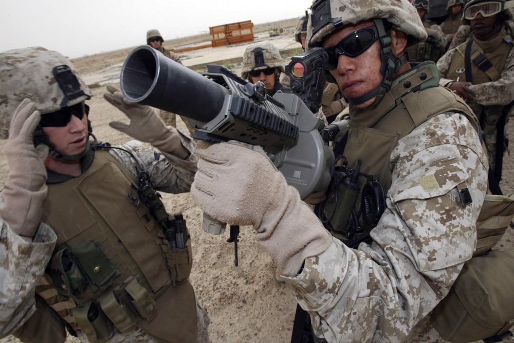 A marine handles the M-32 Multiple shot Grenade Launcher Canvas Art - Stocktrek Images (34 x 23)