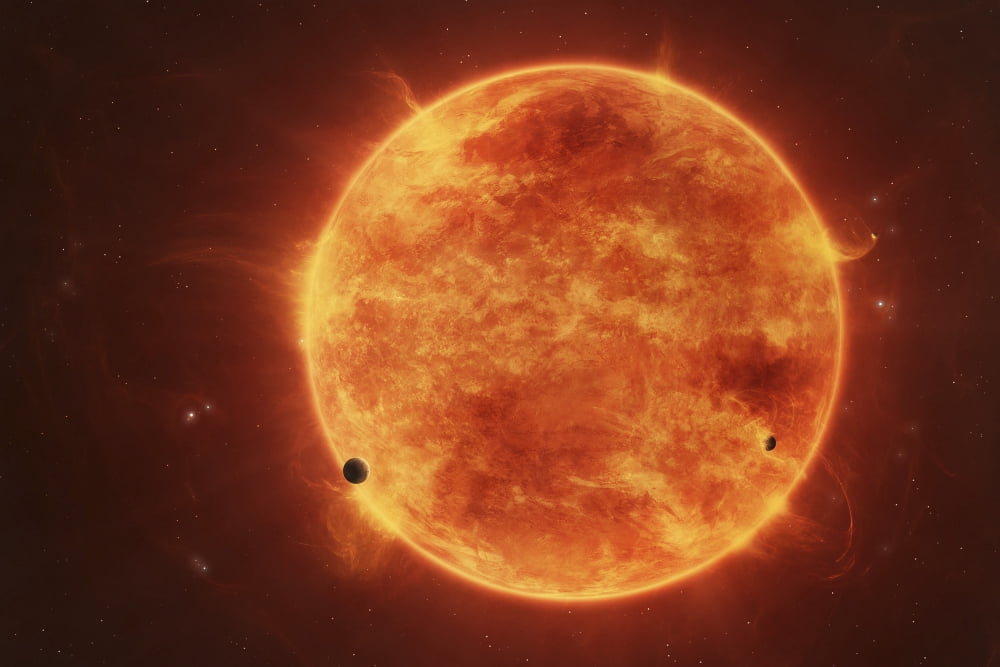 A massive red dwarf consuming planets within its range Canvas Art - Tomasz DabrowskiStocktrek Images (17 x 12)