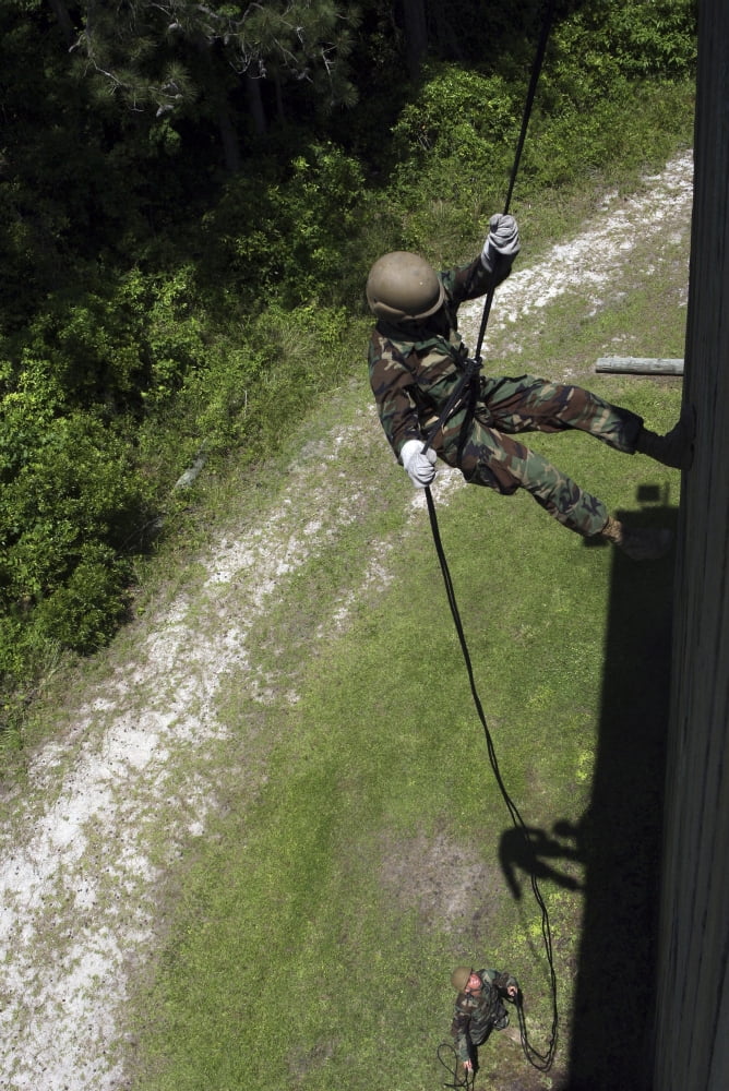 A midshipman rappels down a wall during a training exercise Canvas Art - Stocktrek Images (24 x 35)