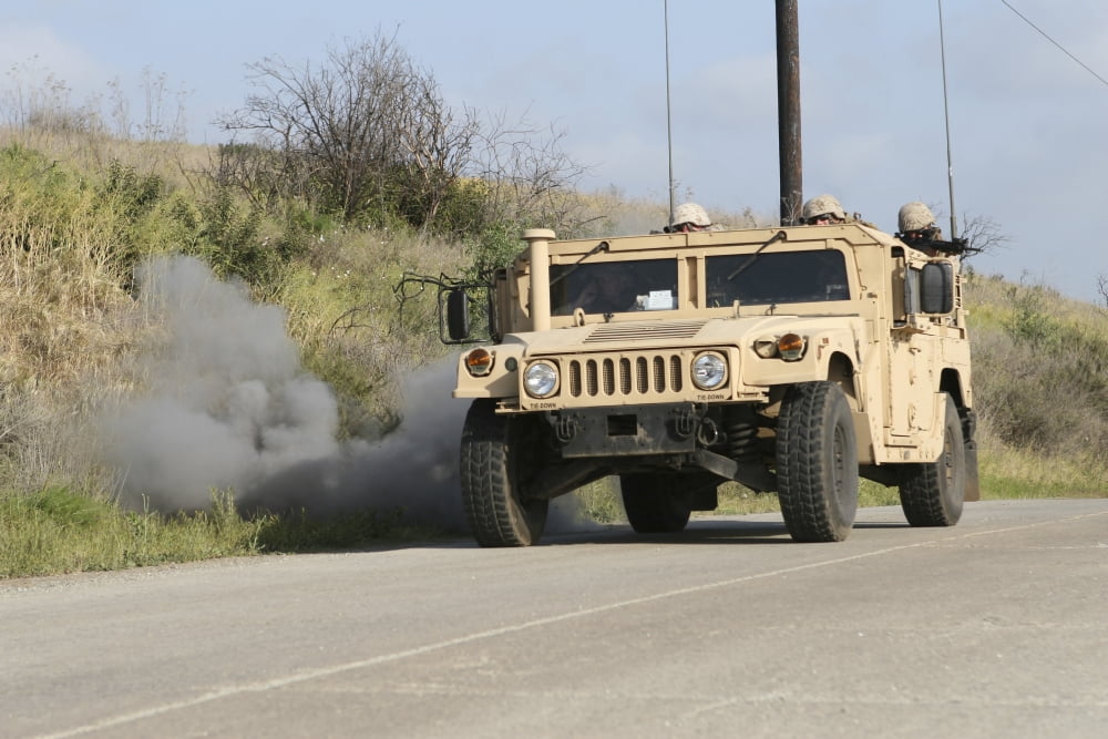 A mock improvised explosive device explodes in the window of a humvee Canvas Art - Stocktrek Images (34 x 23)