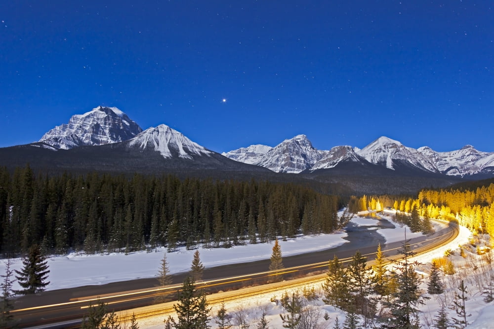 A moonlit nightscape over the Bow River and Morants Curve in Banff National Park Canada Canvas Art - Alan DyerStocktrek Images (35 x 23)