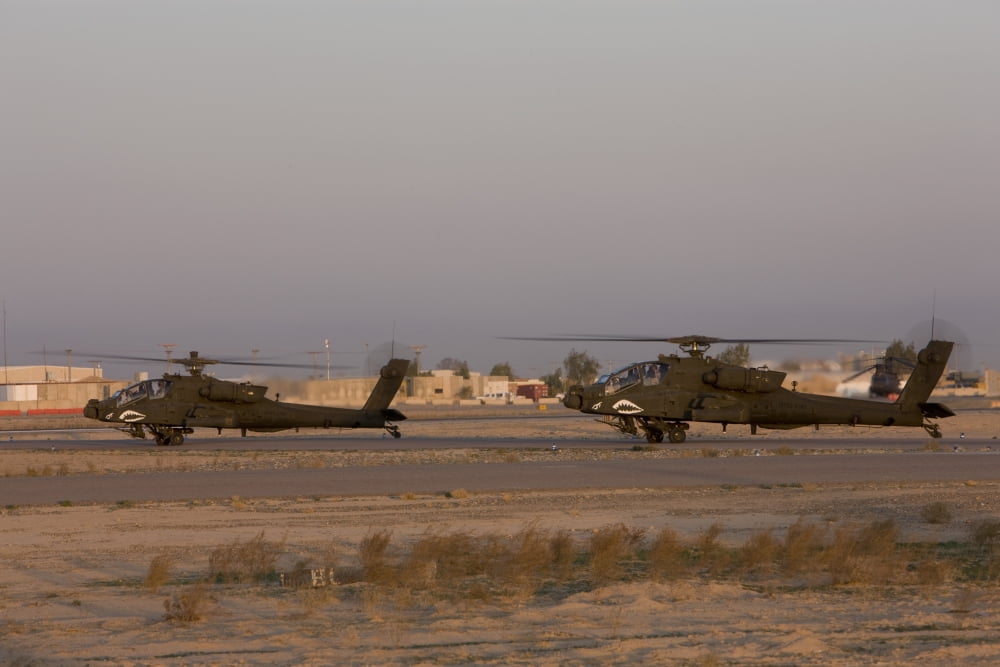 A pair AH-64D Apache Longbow Block III attack helicopters prepare for takeoff Canvas Art - Terry MooreStocktrek Images (18 x 12)