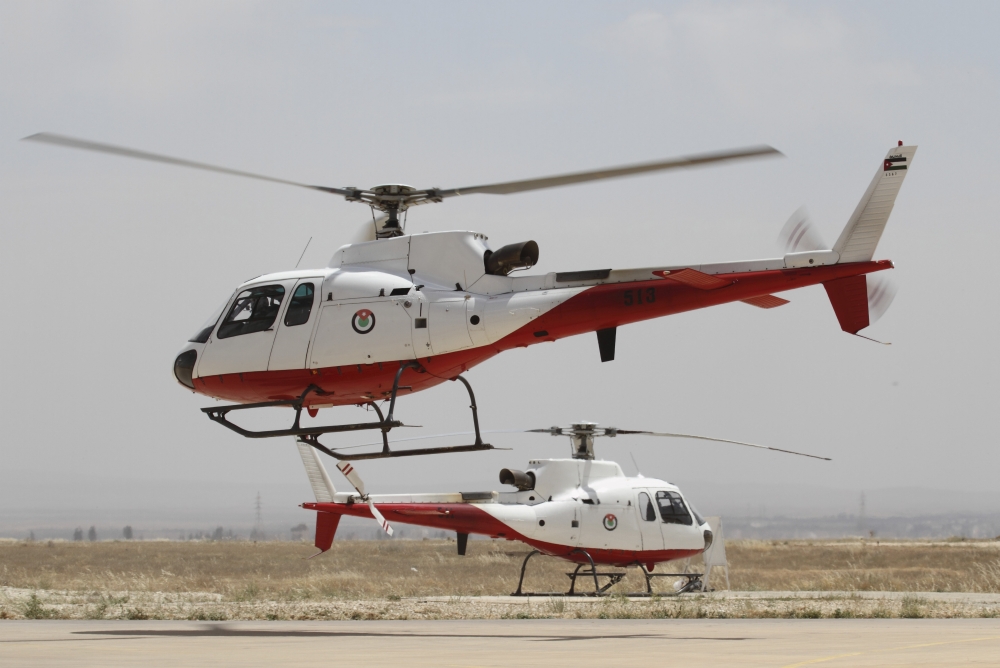 A pair of AS350 Squirrel helicopters of the Royal Jordanian Air Force Canvas Art - Ofer ZidonStocktrek Images (18 x 12)